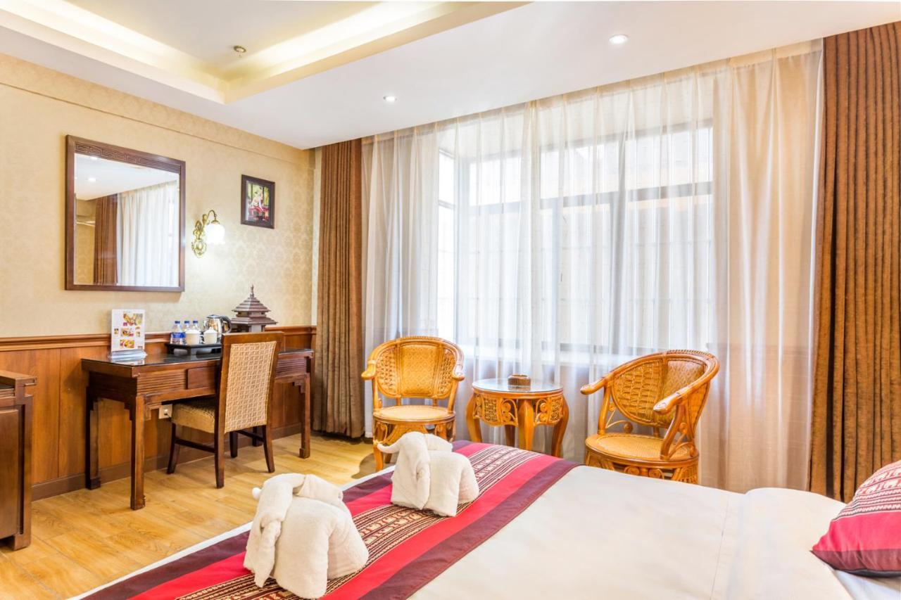 @Siam Hotel Цзинхун Екстериор снимка